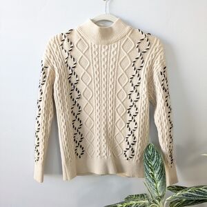 Cable Knit Turtleneck Sweater in Cream With Black Accents